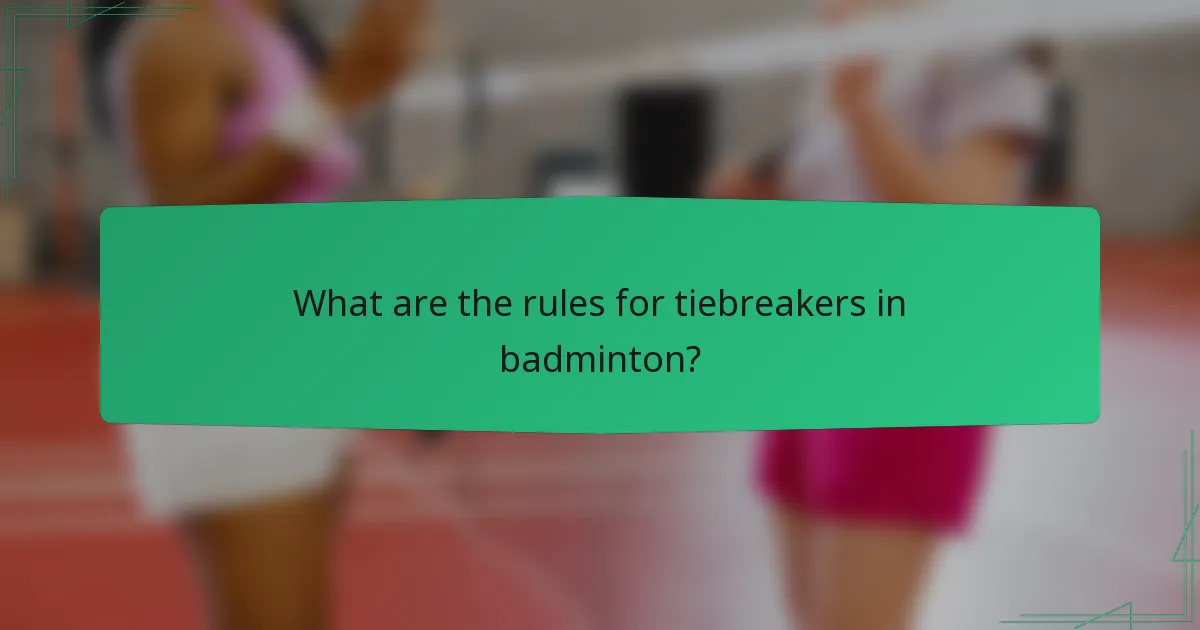 What are the rules for tiebreakers in badminton?